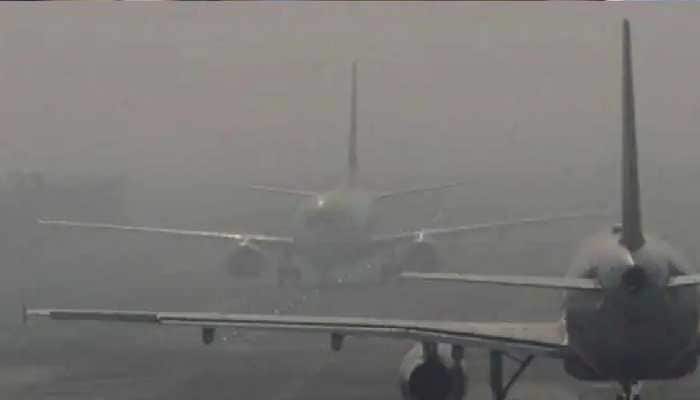 Delhi cold wave: Dense fog delays several flights at IGI airport, advisory issued