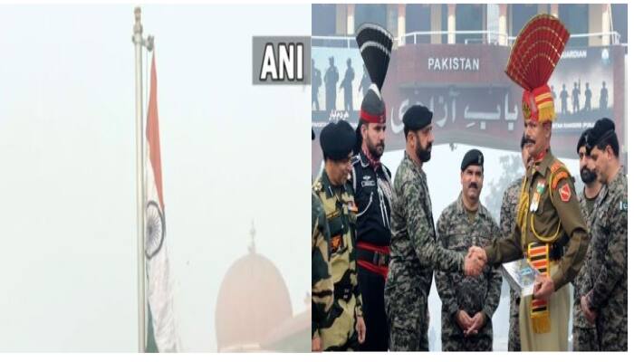 WATCH- BSF unfurls the National Flag at the Attari border, exchanges sweets