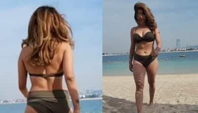 Neha Bhasin Flaunts her Curves in Gorgeous Bikini as she Takes a Walk by the Beach- Watch