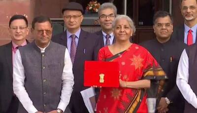 FM Nirmala Sitharaman Takes Tablet in Red Pouch to Parliament to Present Paperless Budget