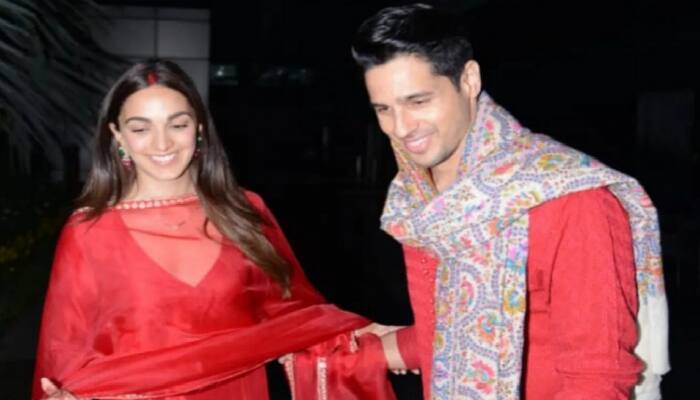 Sidharth Malhotra, Kiara Advani Look Stunning in Red as They Arrive in Delhi, Actor&#039;s Henna of &#039;Ki&#039; Goes Viral