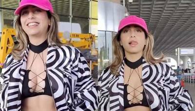 Neha Bhasin Wears Sexy Criss-Cross Bralette With Zebra Print Jacket To Airport - Watch Video