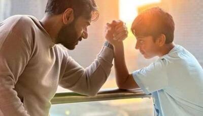 ‘Only Fight That Every Father Wants To Lose’: Ajay Devgn Shares Pic While Arm-Wrestling With Son Yug 