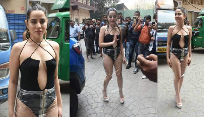 Urfi Javed Wears Transparent Dining Table Plastic Sheet As Skirt Over Risque Black Monokini, Trolls Call Her &#039;Pagal&#039; - Watch