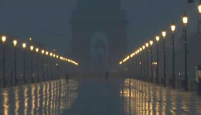 As Delhi Wakes Up To Light Rain, Cloudy Skies And Cold Winds Bring Relief From Heat