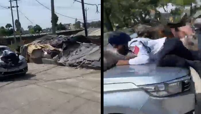 Punjab Traffic Cop Dragged On Top Of Car&#039;s Bonnet For 1 Km - Watch