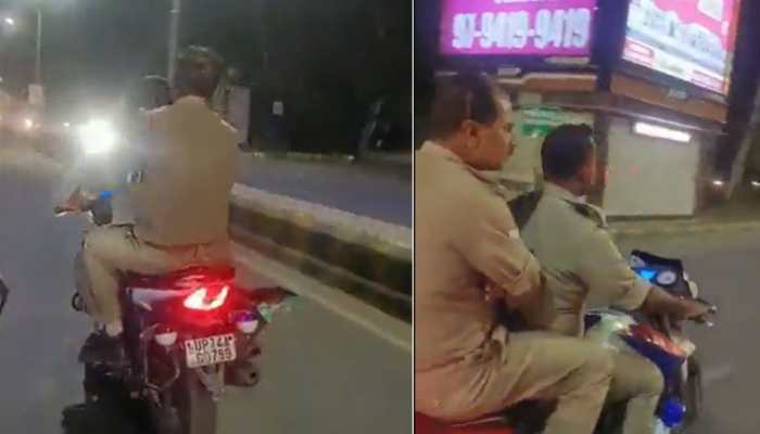 Watch: Video Of UP Cops Riding Bike Without Helmet Goes Viral, Police Takes Action