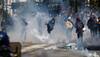 French Police Clash With Protestors During May Day Rallies Against Macron's New Pension Law, Nearly 200 Held
