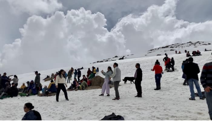 Record Tourists Flock To Kashmir&#039;s Gulmarg Amid Surprise Snowfall In May