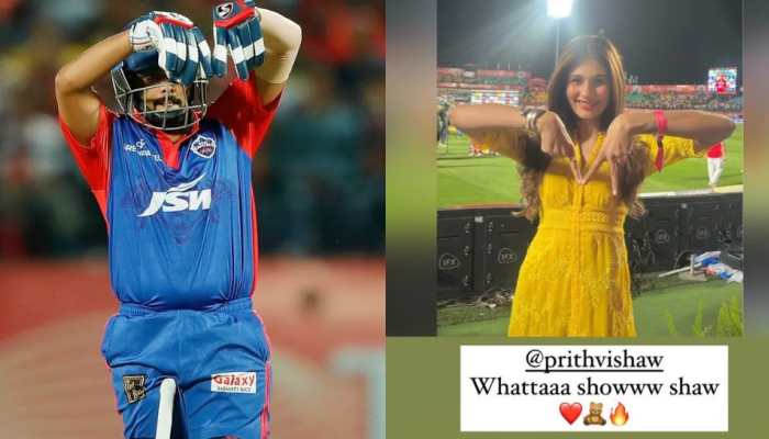 Delhi Capitals opener Prithvi Shaw with his cryptic celebration after scoring fifty in Dharamsala, replicated by 'rumoured' girlfriend Nidhhi Tapadia in her Instagram post (right). (Photo: BCCI/IPL, Instagram)