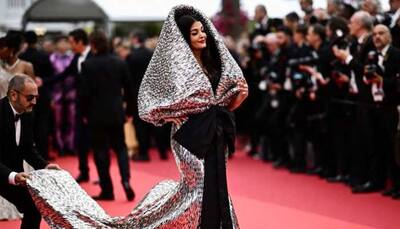 Vivek Agnihotri Slams Costume Slaves Helping Aishwarya Rai Bachchan At Cannes Red Carpet
