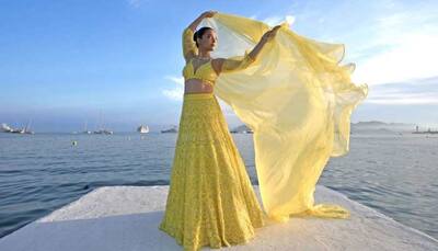 Surveen Chawla Turns Heads At Cannes Film Festival, Shines Bright In Yellow Lehenga