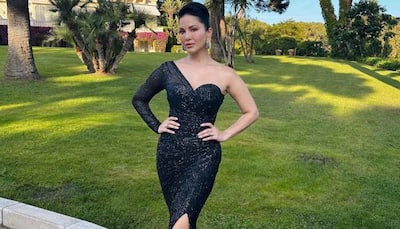 Sunny Leone Looks Breathtaking In Black Cut-Out Shimmering Gown On Amfar Red Carpet at Cannes 2023