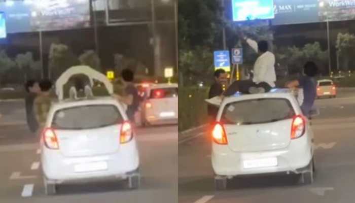 Gurugram Man Seen Drinking, Doing Push-Ups On Top Of Moving Car; Cops Issue Challan