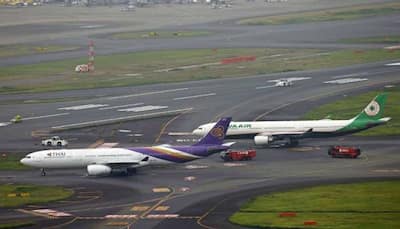 Thai Airways Plane Carrying 250 Passengers Collides With Eva Airways Aircraft At Tokyo Airport