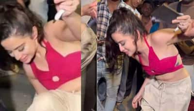 Urfi Javed Trips On High Heels, Falls Down While Clicking Selfie With Fan Wearing Bralette And Wide-legged Pants - Viral Video