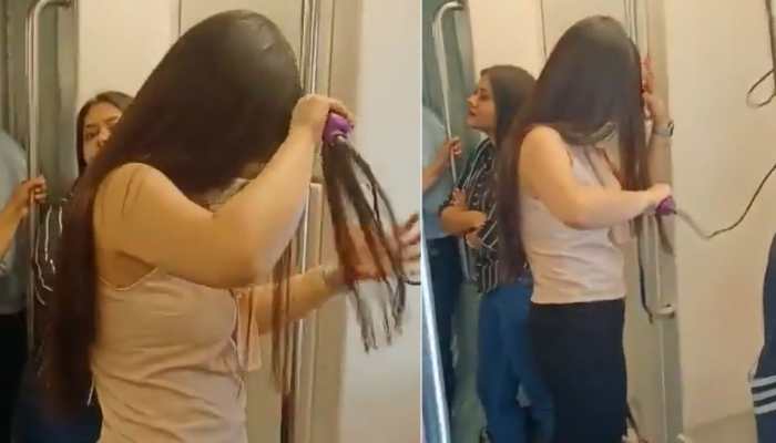 Delhi Metro: Girl Spotted Using Hair Straightener In Train, Video Goes Viral