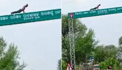Watch: Man Performs Push-ups On High Signboard In Viral Video, Internet Reacts