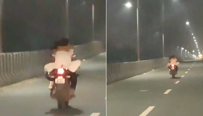 Watch: Couple Kissing On Bike In Delhi NCR Goes Viral, Netizens Reacts