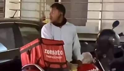 Watch: Zomato Delivery Agent Eats Chawal Dal From A Plastic Bag, Video Goes Viral, Netizens Say Heartbreaking
