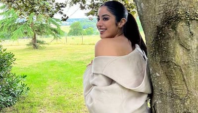 Janhvi Kapoor's New Sassy Pics In White Off-Shoulder Trench Coat Are Here