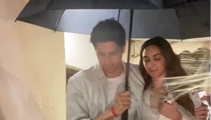 Viral Video: Sidharth Malhotra Pulls Kiara Advani Close Under Umbrella Amid Mumbai Rains