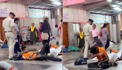 Viral Video: Police Officer Pours Water On People Sleeping On Railway Platform In Pune, Official Reacts