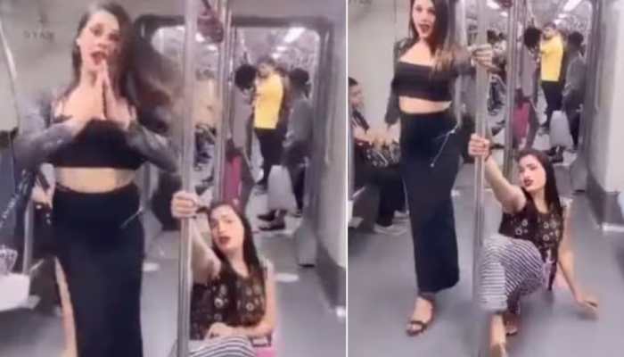Watch: Video Of Women &#039;Pole Dancing&#039; In Delhi Metro Goes Viral, Netizens React