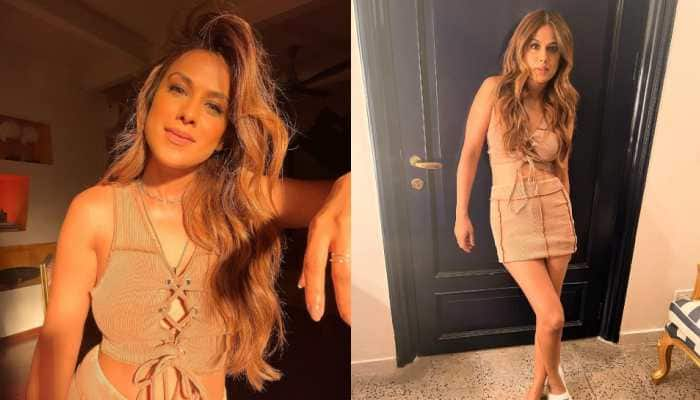 Nia Sharma Slays The Sun-Kissed Look In Bold Nude Outfit, Netizens Tease Her For Wearing Different Footwear