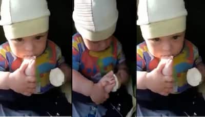 Viral: Little Kid Finds New Way To Eat Icecream; Watch Oddly Cute Video