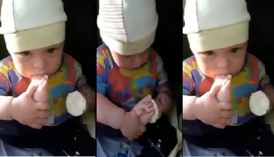 Viral: Little Kid Finds New Way To Eat Icecream; Watch Oddly Cute Video