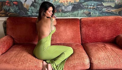 Aashram 3 Actress Esha Gupta Oozes Oomph In A Green Backless Bodycon, Poses In Sultry Avatar - Pics