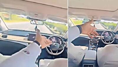 Mahindra XUV700 Owner Sits In Back Seat In Moving Car, Video Goes Viral