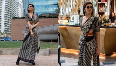 Karishma Tanna Spells Glam In Stunning Black And White Saree, Adds A Classic Twist In Her Trip To Busan
