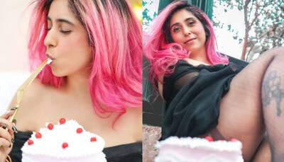 Neha Bhasin Flaunts Pink Hair, Bold Black Dress As She Cuts Her Birthday Cake