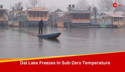 Thin Layer of Ice Blankets Dal Lake As Srinagar Chills At -5.2 Degrees Celsius