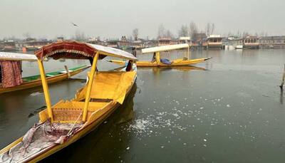 Srinagar's Famous Dal Lake Freezes As Severe Cold Conditions Continue In Kashmir