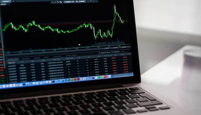 Stock Markets Settle Flat In Volatile Trade Ahead Of RBI's Interest Rate Decision 