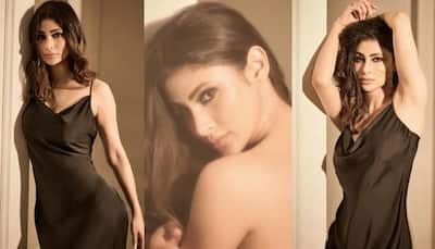 Mouni Roy Strikes Sultry Pose In Bold Black Dress, Netizens Call Her 'Mirchi' 