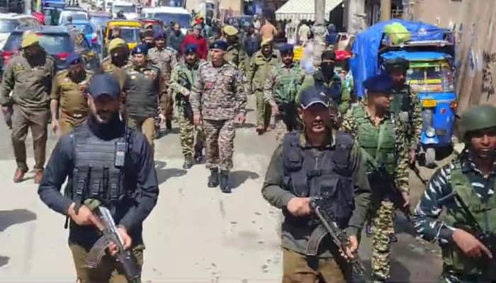 J&amp;K Police, Security Forces HOld Flag March Across Valley Ahead of LS Polls