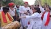 Drums of victory echo at SP-Congress offices, silence engulfs BJP Headquarters