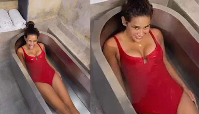 Aisha Sharma Takes A Cold Plunge In Freezing Water Wearing Red Sizzling Bathsuit, Beats June Heat Like This - Watch