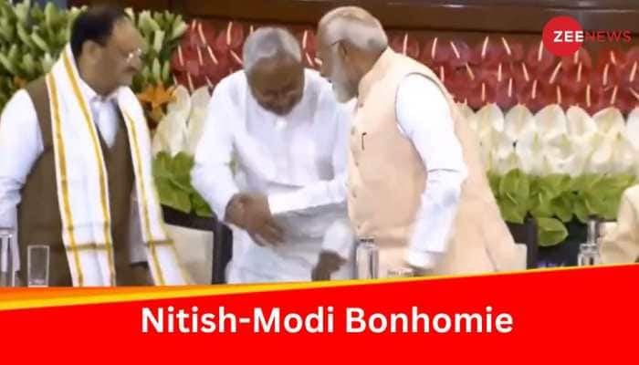 Watch: At NDA MPs Meet, Nitish Kumar Touches PM-Elect Narendra Modi&#039;s Feet