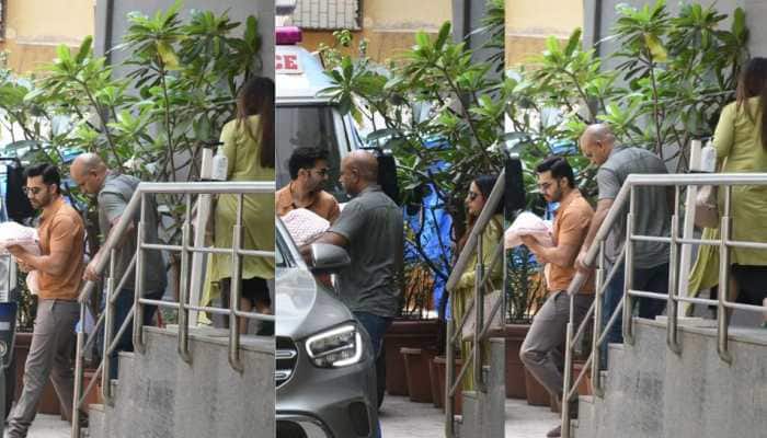 Varun Dhawan’s First Appearance With Daughter And Wife Natasha As They Rush Home - Watch