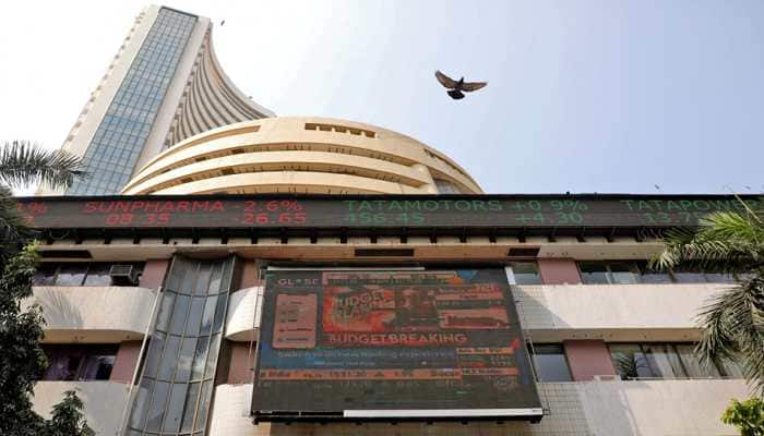 Sensex, Nifty Settle Almost Flat Amid Volatile Trade 