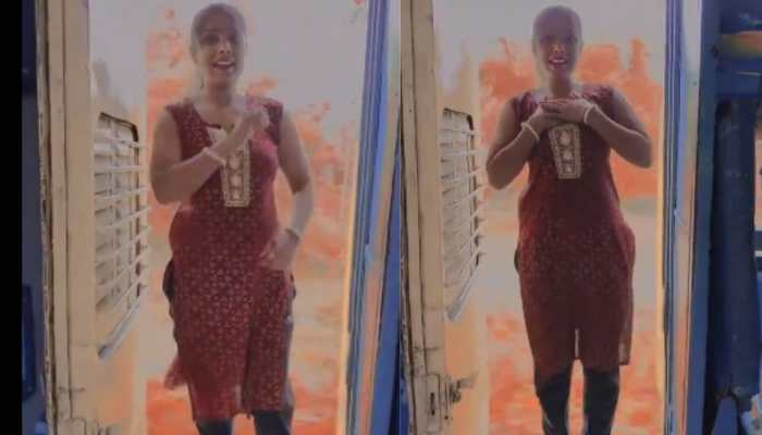 Mumbai Girl’s Risky Stunt On Moving Train Goes Viral: Watch Video