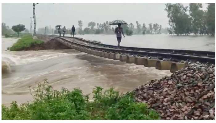 Akhilesh Yadav Mocks BJP As Railway Tracks Hang After Rail Bridge Gets Washed Away - Viral Video