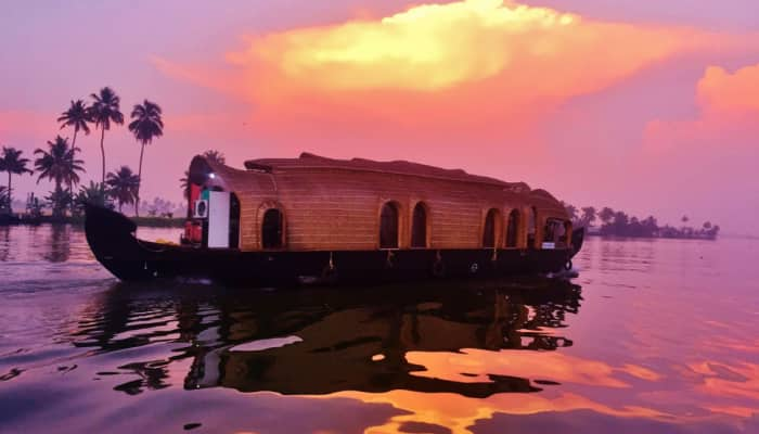 Explore the 7 Wonders of Kerala: Waterfalls, Tea Gardens, Backwaters, and More