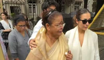 Malaika Arora Holds Her Tears As She Walks Along With Her Mom For The Last Rites Of Her Father 