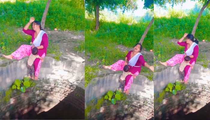 Shocking Viral Video: Mother Holds Child Over Well's Edge While Posing